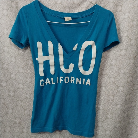 Y2K VINTAGE Hollister Blue Vneck Tshirt With Logo Lettering Front Sz XS / S - Picture 1 of 7